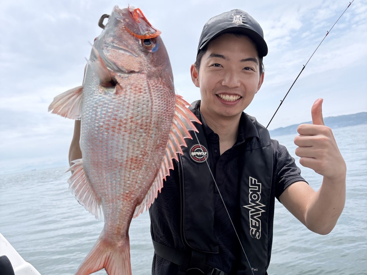 A red sea bream caught on Osaka Bay, held on deck