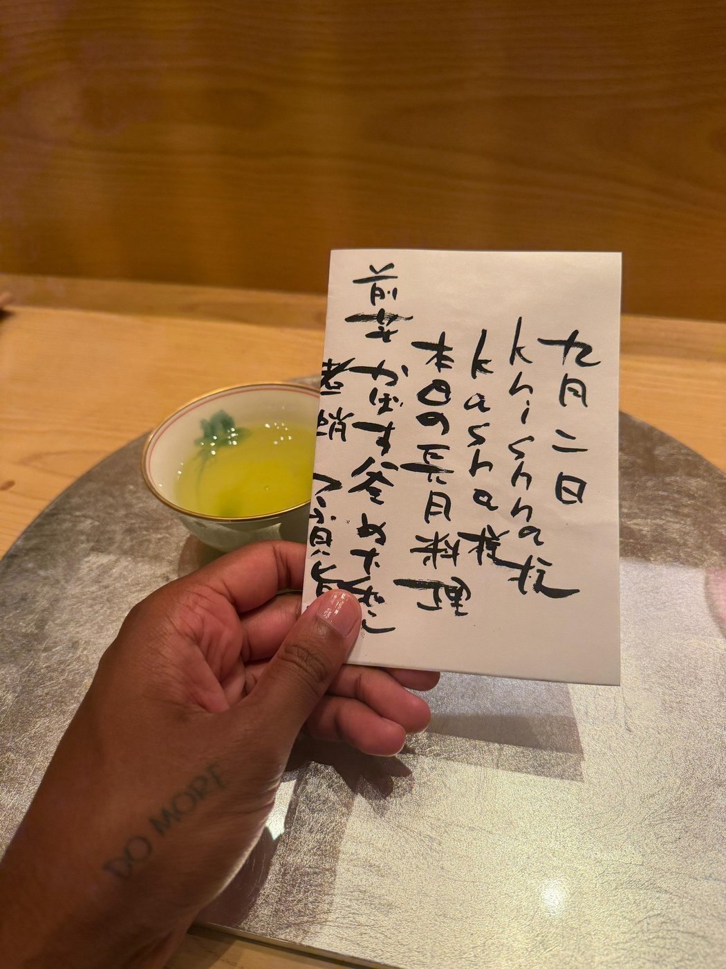 A handwritten card from the restaurant